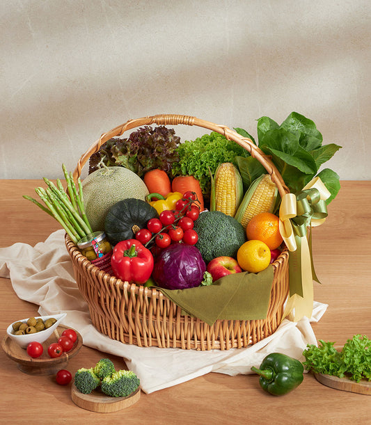 Premium fresh vegetable and fruit gift basket with green ribbon, artisan wicker design