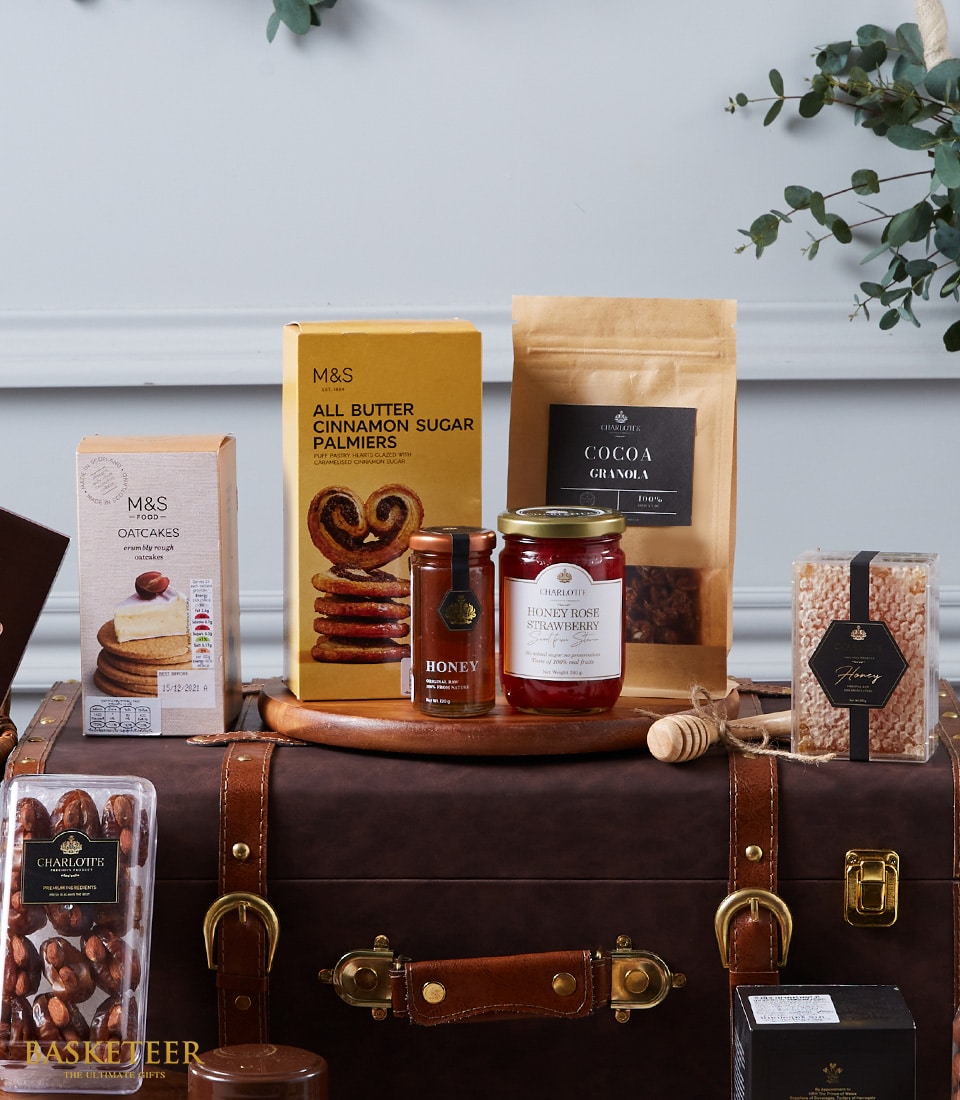 Prestigious International Goods Hamper with gourmet chocolates, palmiers, granola, honey, jam, oatcakes, and honeycomb in