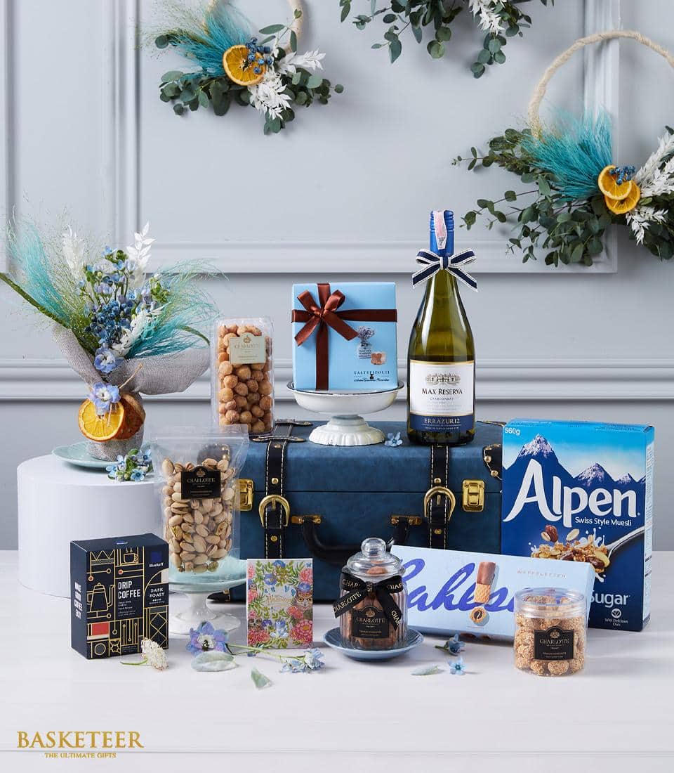 Luxury white wine gourmet hamper with artisan snacks, Swiss muesli, and specialty coffee in curated keepsake box