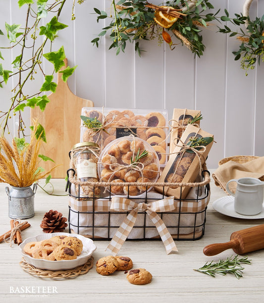 Premium gourmet cookie gift basket with shortbread, jam tarts, and artisan baked goods for New Year