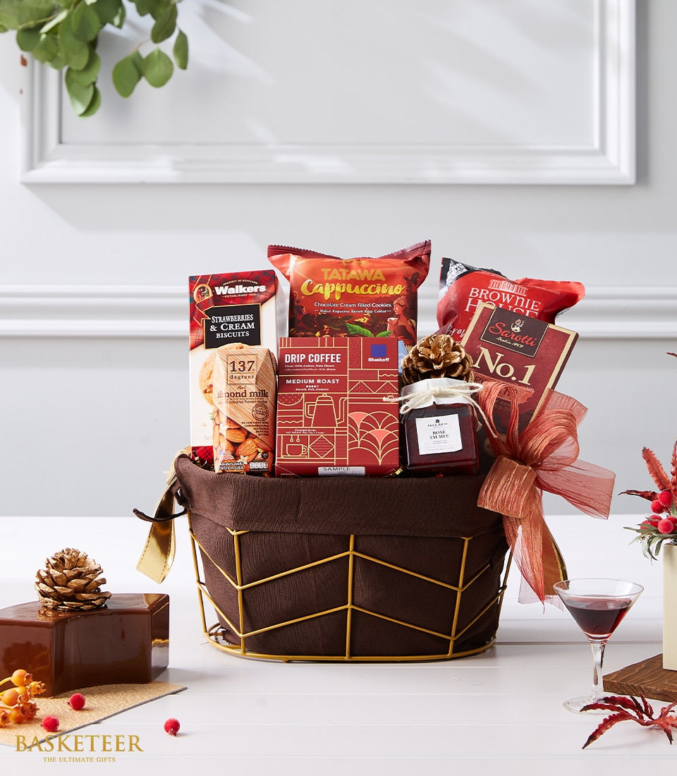 Regal International gourmet gift basket with cappuccino cookies, coffee, biscuits, and jam for New Year gifting