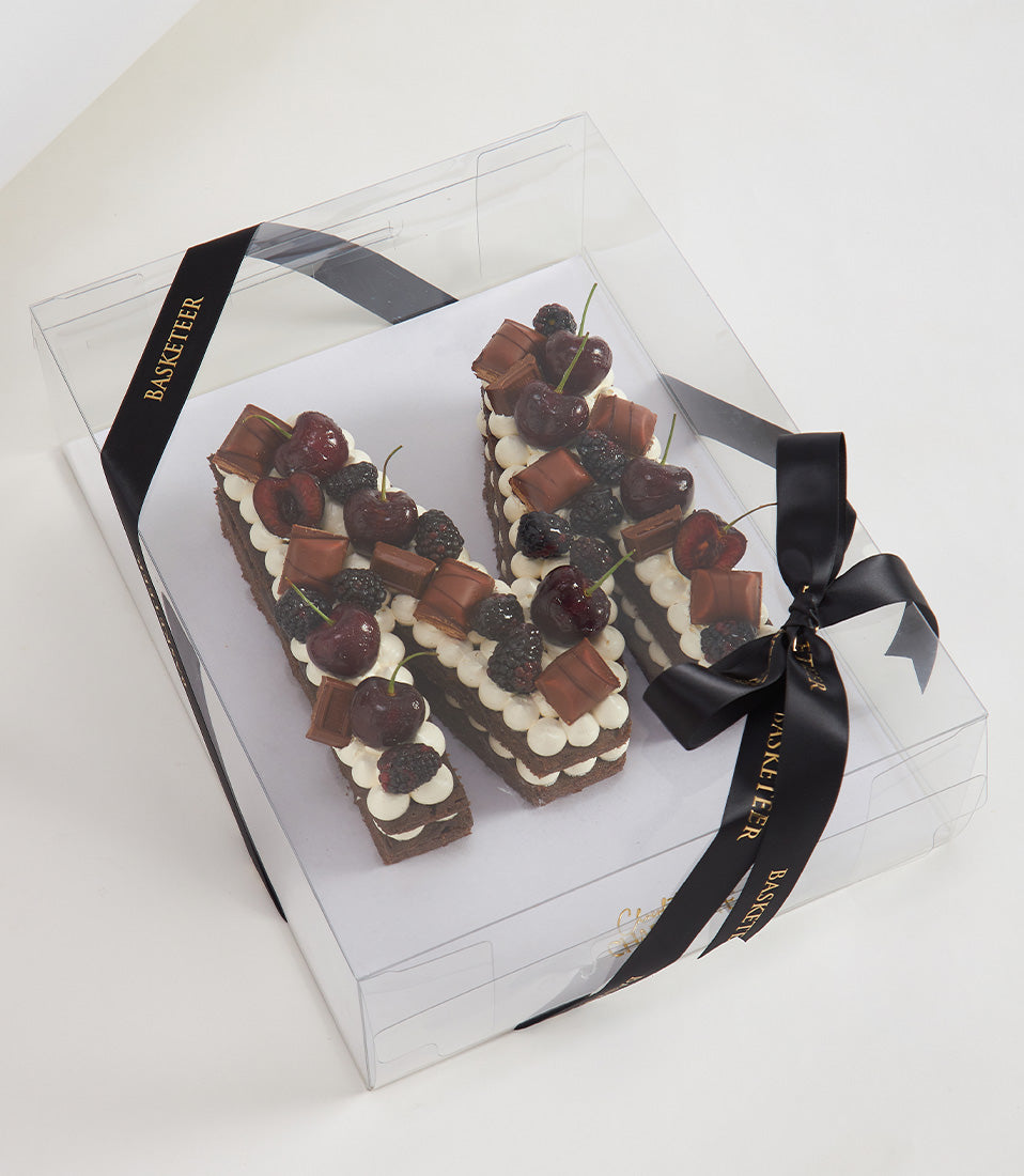 Chocolate cherry letter cake M with fresh berries and chocolate bars in branded Basketeer gift box