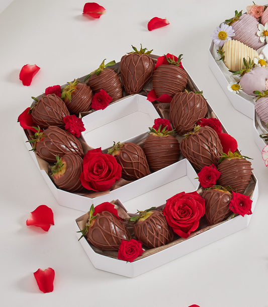 Number-shaped chocolate strawberry gift boxes with fresh red roses and artisan Belgian chocolate dipping