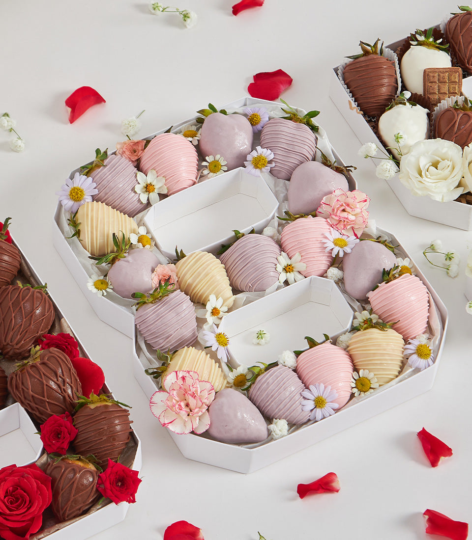 Birthday number cake box with chocolate-covered strawberries and fresh flowers