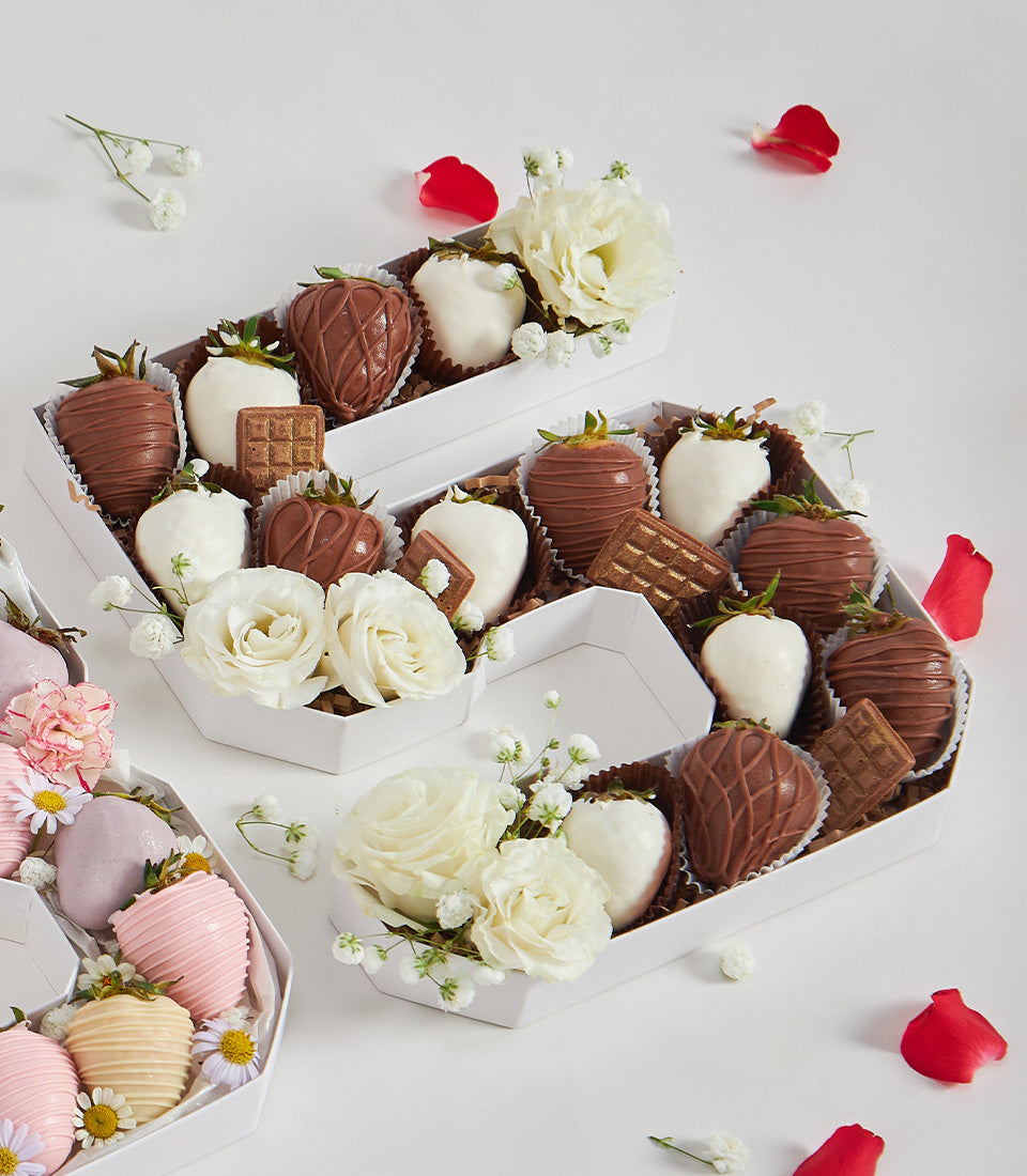 Sweet number gift box with chocolate-covered strawberries, white roses, and artisan chocolates for birthday celebrations
