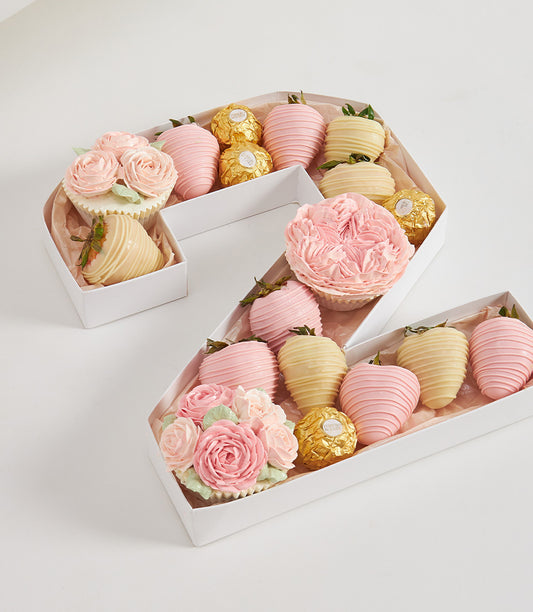 Romantic number 2 box with chocolate strawberries, gold Ferrero Rocher, and pink buttercream flower cupcakes