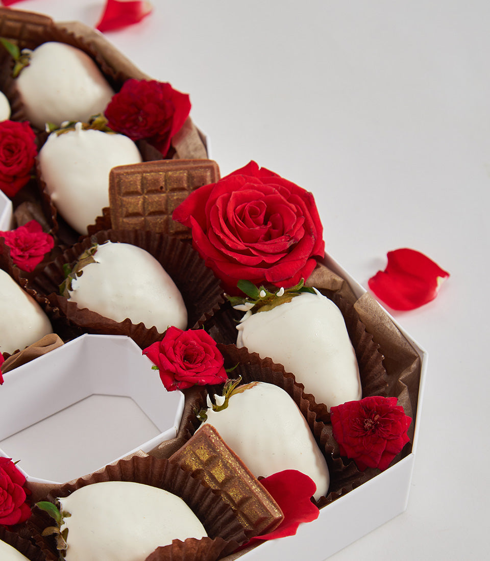 Number-shaped white chocolate strawberry box with dark chocolate bars and red roses for birthday gifts