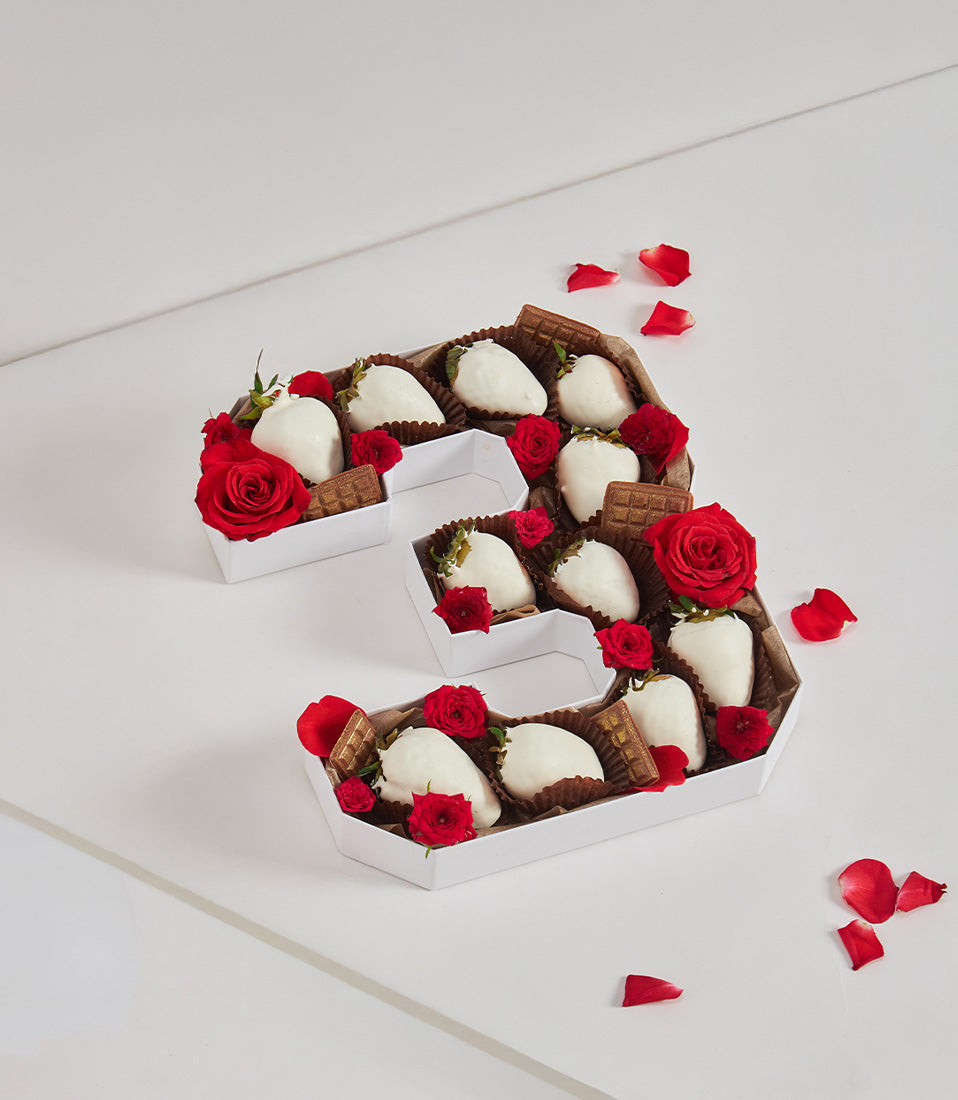 Number 3 shaped strawberry chocolate gift box with rose petals and artisan treats