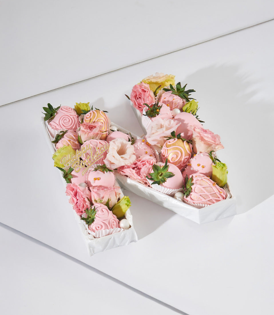Luxury strawberry and flower letter H with chocolate-covered berries, fresh roses, and gold Happy Birthday pick