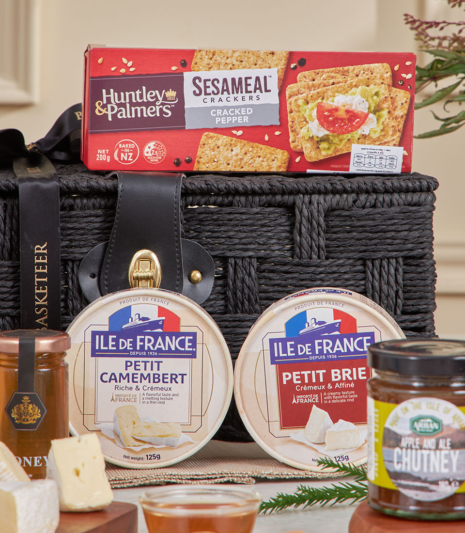 Premium gourmet cheese and chutney gift basket with Camembert, Brie, crackers, and artisan preserves