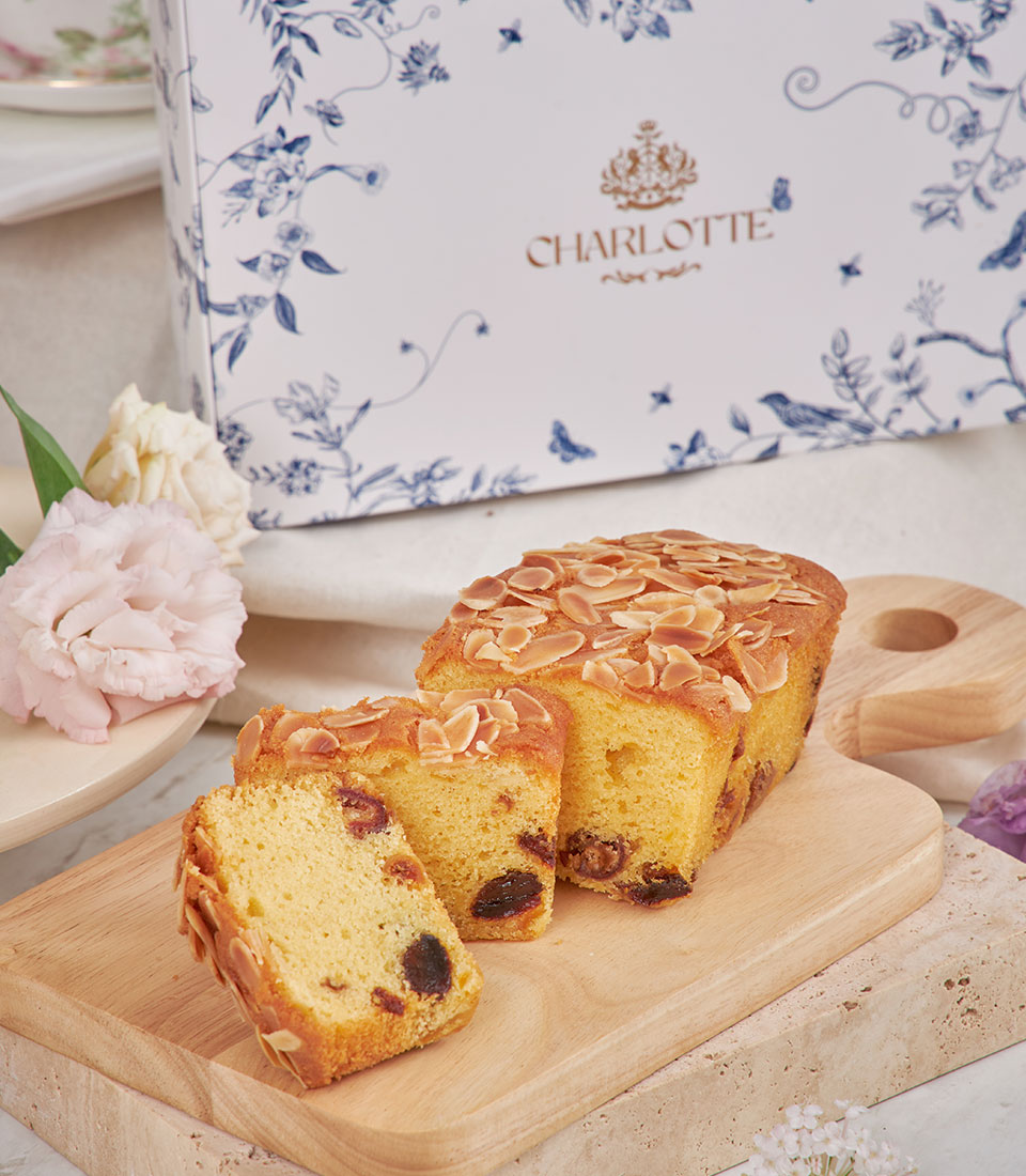 Charlotte Bakery afternoon tea loaf cake with almond and dried fruit, gift-boxed with fresh flowers