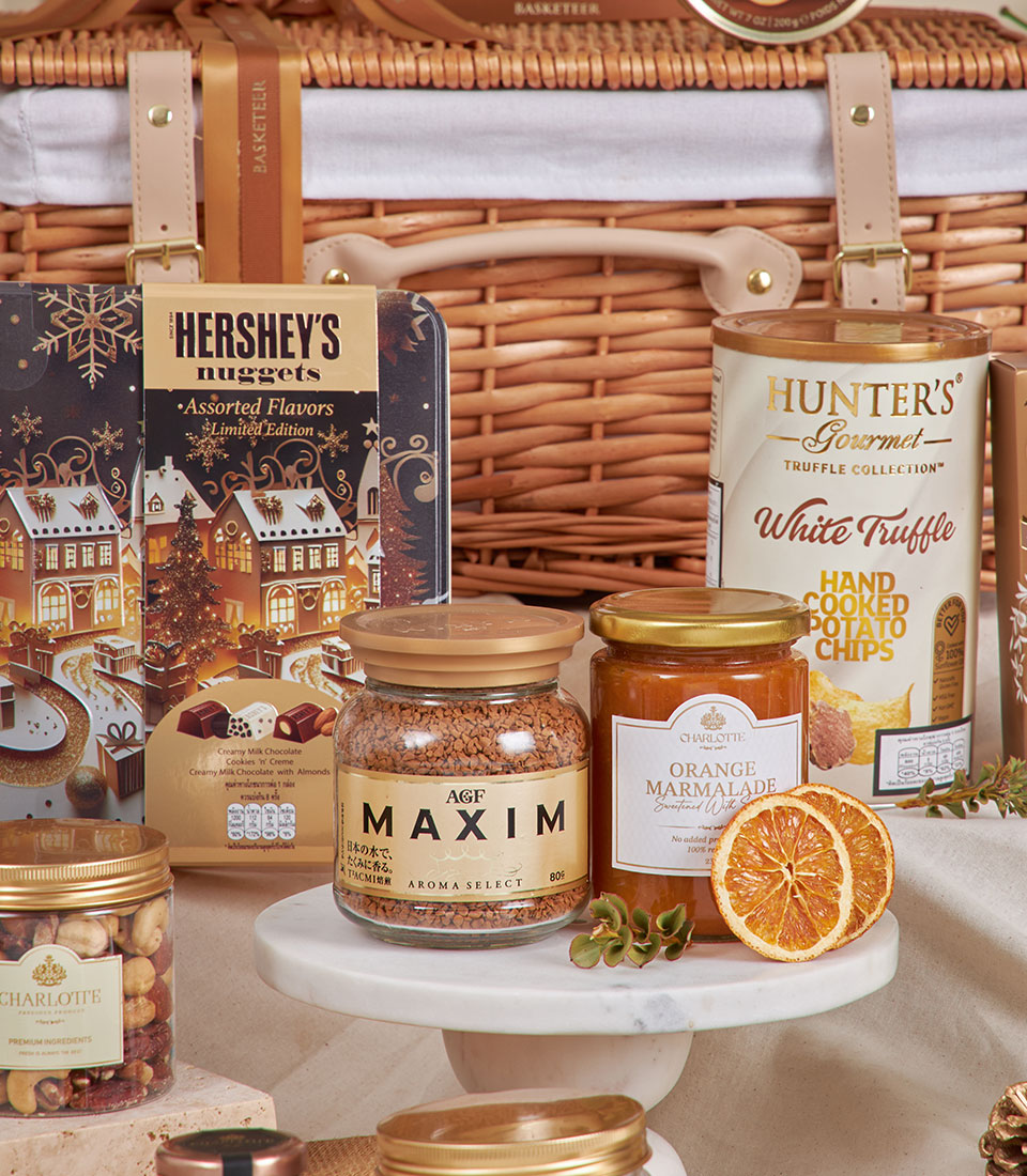 Luxury gourmet hamper with Hershey's chocolates, truffle chips, Charlotte marmalade, and premium coffee for New Year gifting