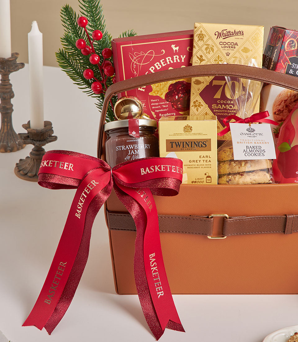 Premium leather gift hamper with raspberry cookies, dark chocolate, Earl Grey tea and gourmet treats, New Year gifting