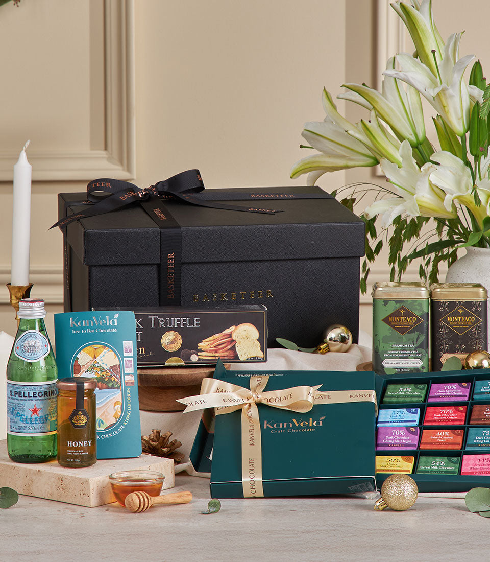 Premium chocolate and tea gift hamper with artisan truffles, gourmet teas, and honey for New Year celebrations