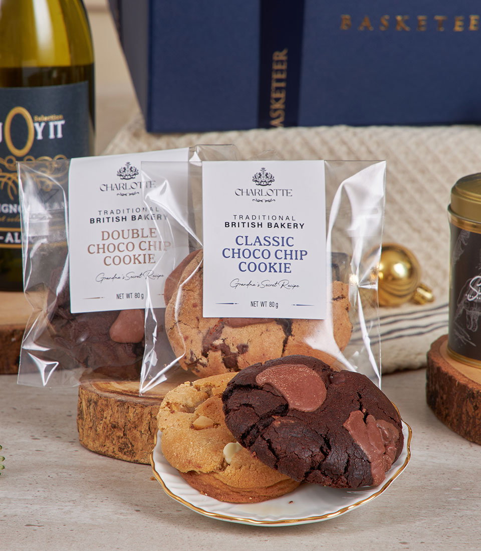 Premium white wine dessert gift box with dark chocolate chip cookies and artisan baked goods, perfect for New Year