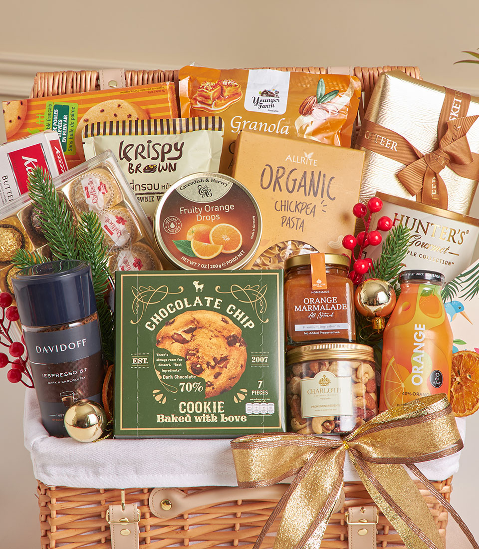 Luxury New Year gourmet hamper with chocolate truffles, premium espresso, artisan snacks in woven basket with gold ribbon