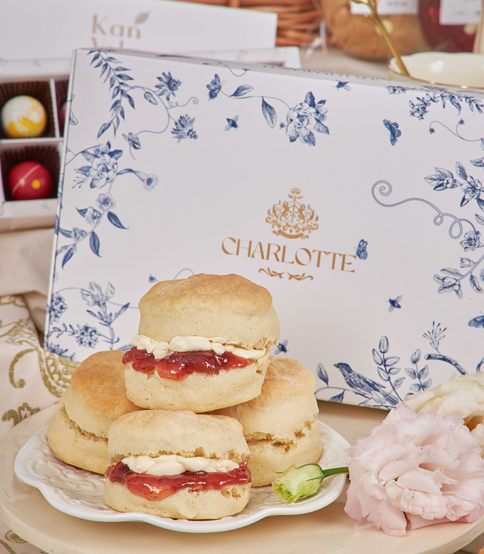 Charlotte Bakery luxury afternoon tea hamper with scones, clotted cream, jam, and gourmet treats