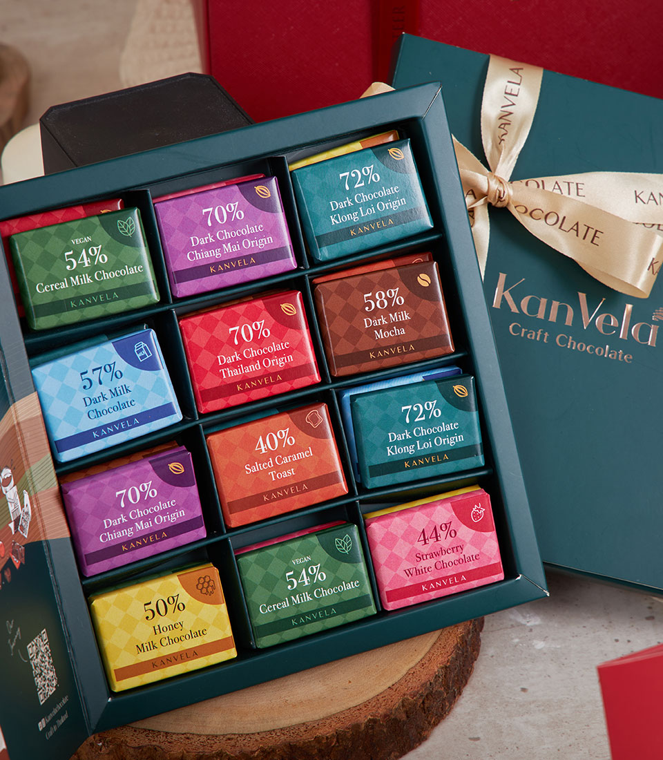 Teal luxury chocolate hamper with twelve artisan bars, gold ribbon, New Year gift set