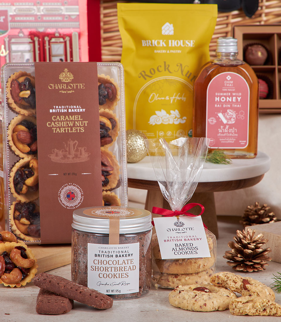 Sparkling chocolate and caramel luxury hamper with artisan tartlets, shortbread cookies, and honey for New Year gifting