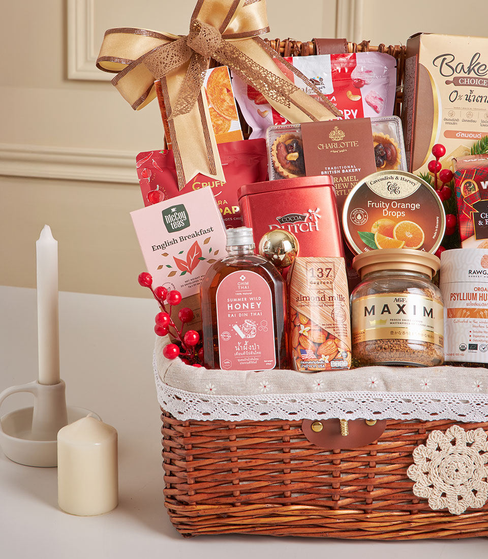 Premium gourmet hamper with almond milk, honey, coffee, and artisan treats in woven wicker basket, New Year gift