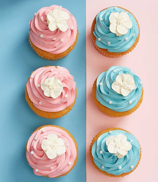 Sweet Jasmine Bliss cupcakes with pink and blue frosting, white flower toppers, and pearl sprinkles for Mother's Day