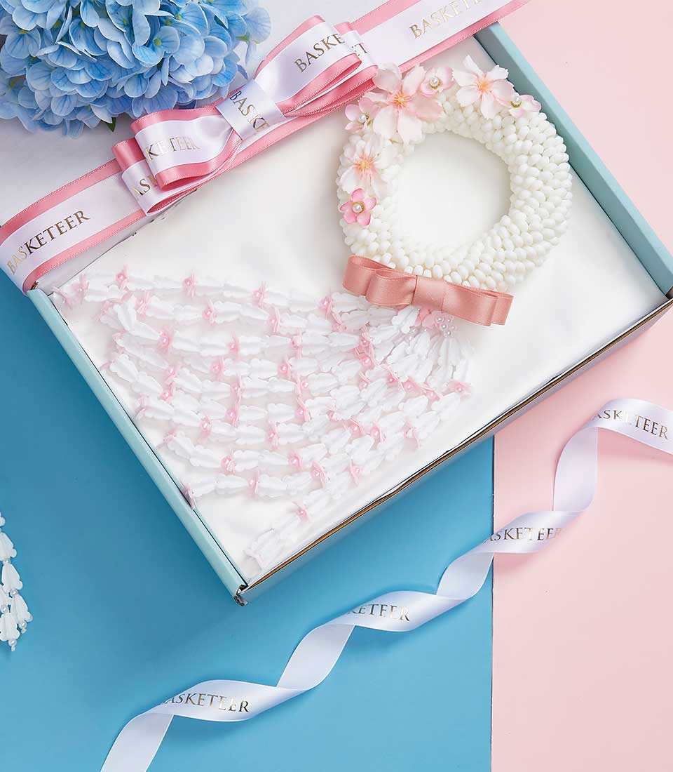 Mother's Day Thai jasmine garland gift box with pink florals and pearls in light blue presentation
