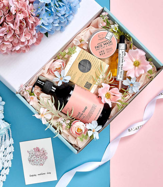 Light blue luxury spa gift box with rose castile soap, clay face mask, and artisan skincare for Mother's Day