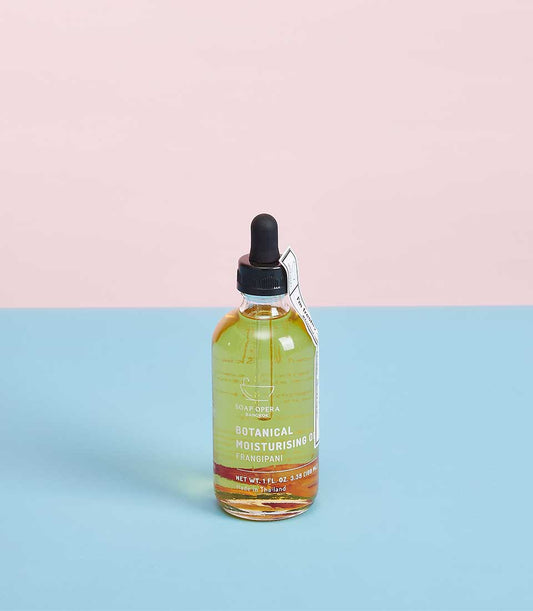 Light yellow botanical moisturising oil with frangipani absolute in glass dropper bottle, Mother's Day gift