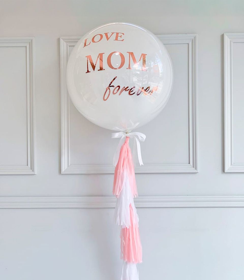 Rose gold "LOVE MOM forever" balloon with pink and white tassel garland