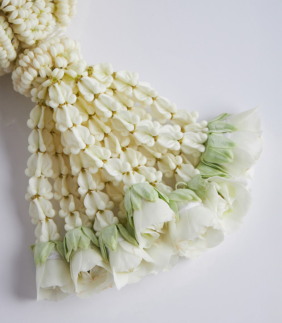 Elegant white jasmine and rose phuang malai garland for Mother's Day