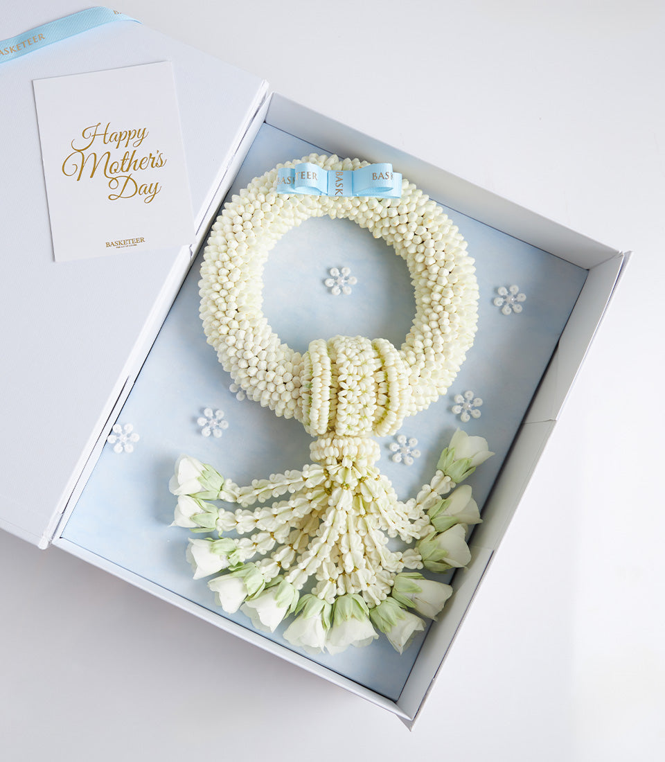 Elegant white phuang malai Thai garland with rosebuds in gift box, Mother's Day greeting card included