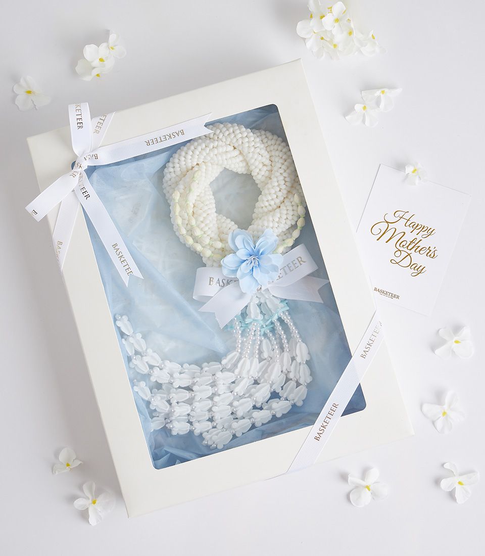White jasmine phuang malai garland with light blue flowers and beaded strands, Mother's Day gift set in white box