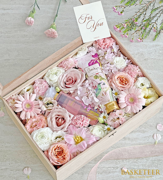 Pink rose and peach gerbera spa gift box with lotion and fragrance spray for Mother's Day