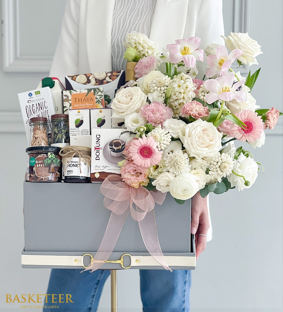 Pink and white fresh flower bouquet with gourmet gift box featuring Doitung coffee, honey, and dried mango