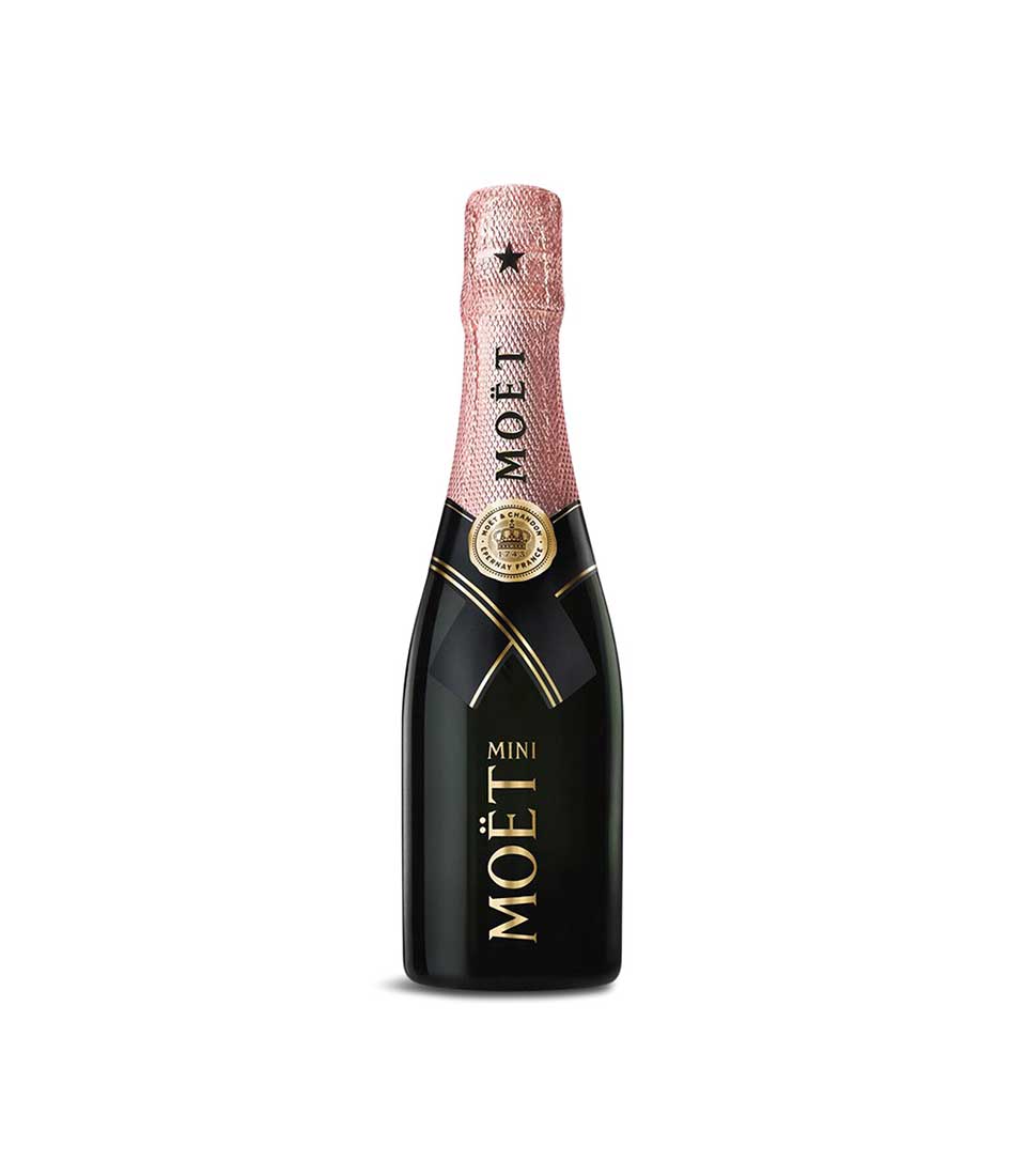 Mini Moët & Chandon Impérial rosé champagne with rose gold foil on white background