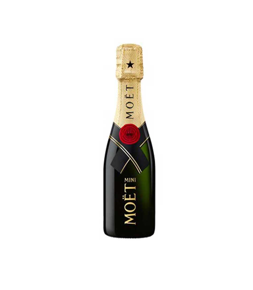 Moët & Chandon Mini Imperial champagne bottle with gold foil and black label, luxury gift for celebrations