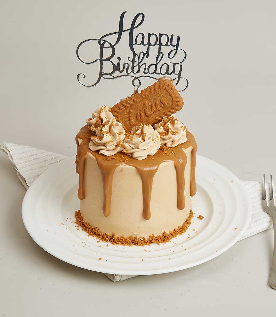 Lotus Biscoff & Caramel mini birthday cake with biscuit crumb frosting and dark caramel drip