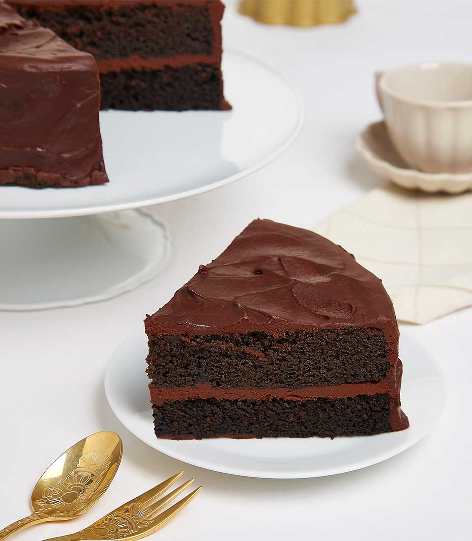 Rich chocolate layer cake with swirled frosting, premium bakery gift for chocolate lovers