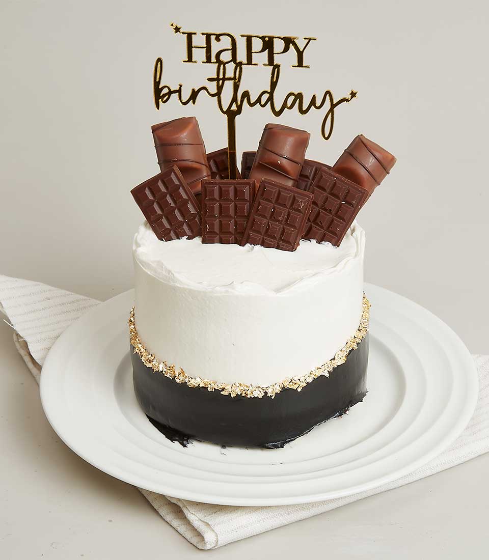 Black and white mini layer cake with gold leaf and chocolate decorations, Happy Birthday topper