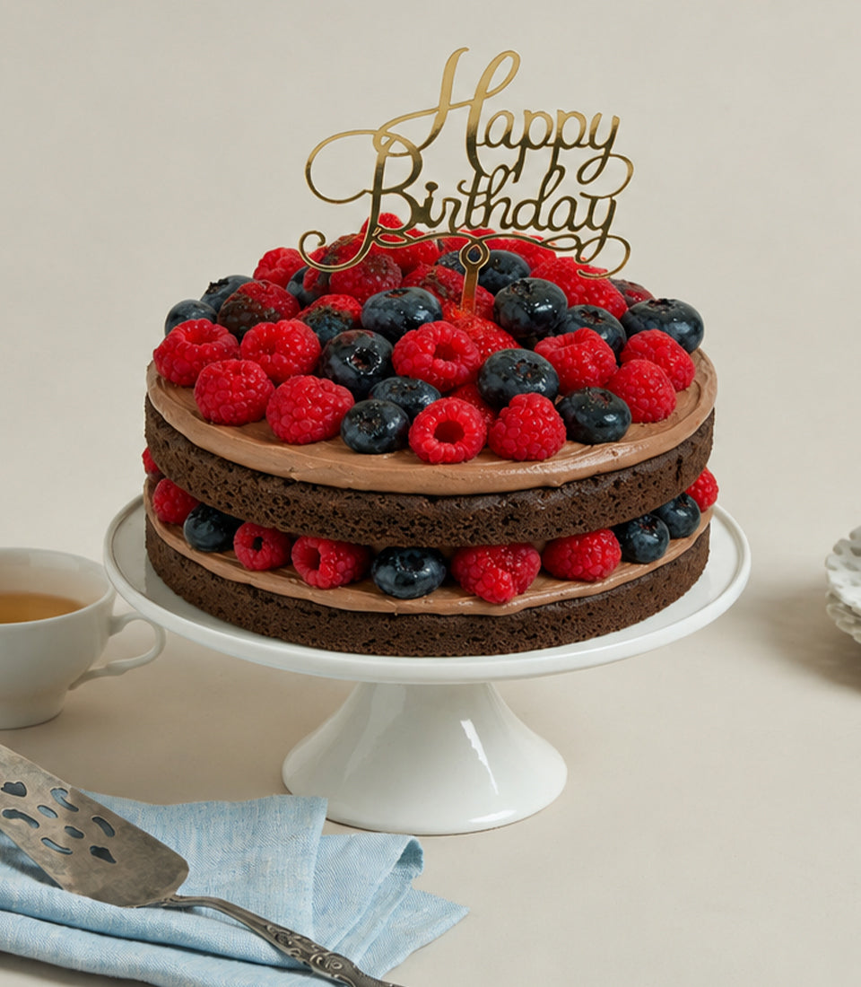 Charlotte Bakery artisan two-tier chocolate birthday cake with creamy chocolate frosting,