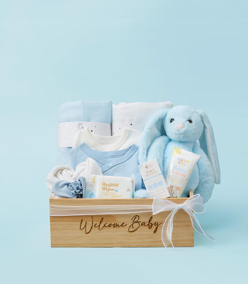 Welcome Baby boy gift hamper with muslin blankets, bodysuits, booties and skincare in wooden box