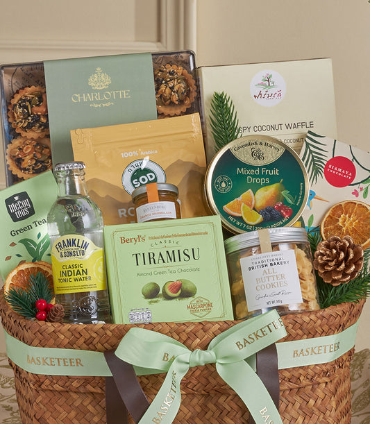 Green Harmony gourmet gift basket with Charlotte Bakery baked goods, coffee, tonic water, and artisan treats for New Year