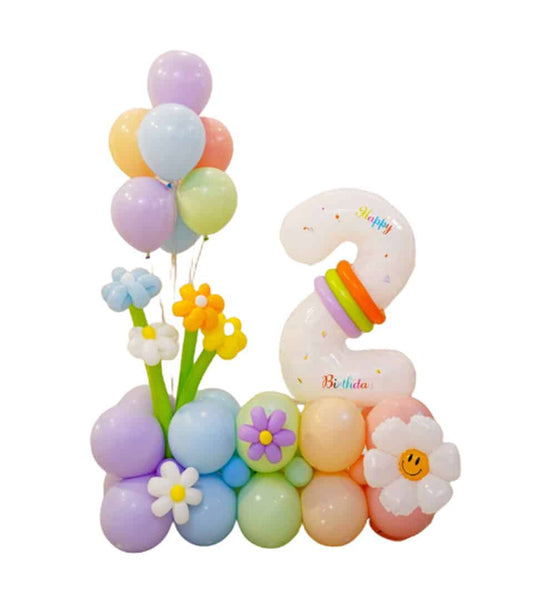 Pastel daisy and number 2 balloon arrangement for 2nd birthday celebrations with colorful flowers