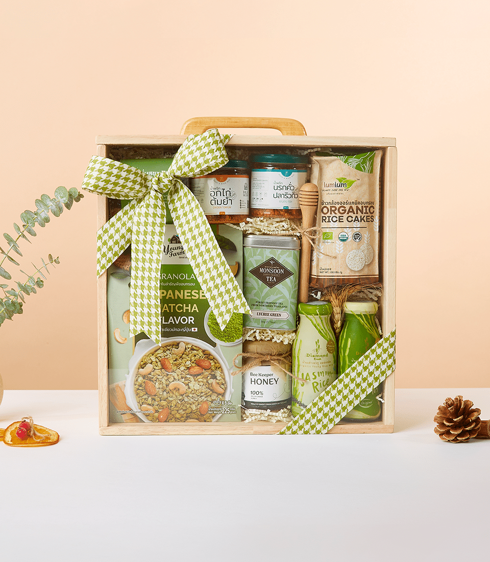 Healthy Living Essentials gift box with organic rice cakes, lychee green tea, honey, matcha granola, and jasmine rice