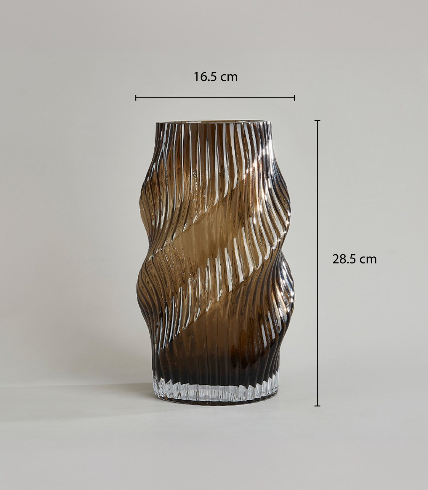 Amber spiral swirl glass vase with ribbed texture and wavy design