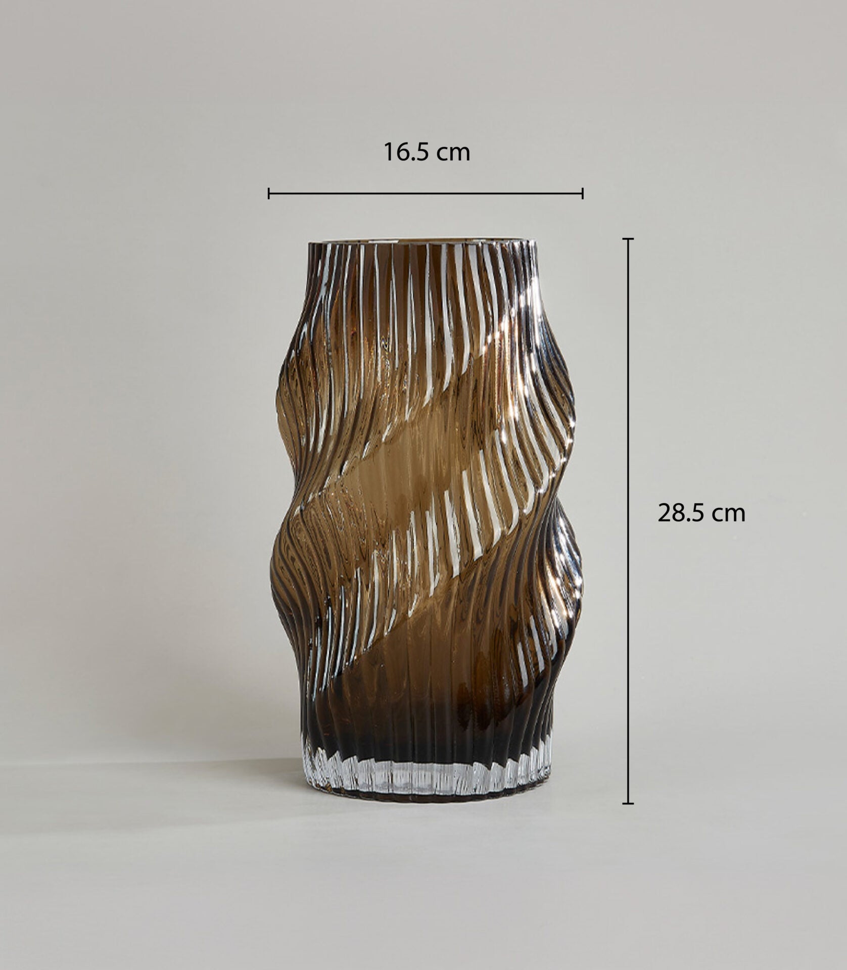 Amber spiral swirl glass vase with ribbed texture and wavy design