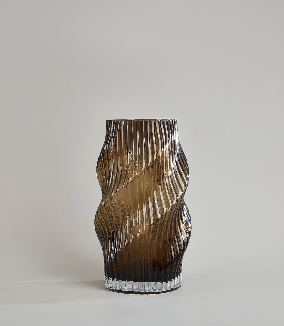 Tall amber spiral swirl glass vase with twisted ribbed design and smoky brown translucent finish