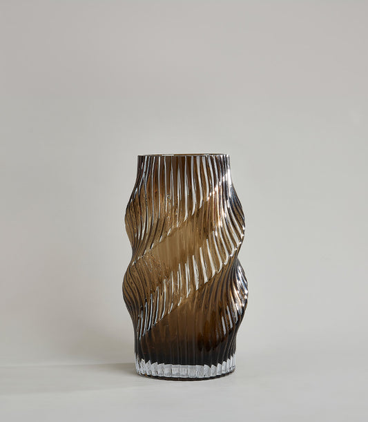 Tall amber spiral swirl glass vase with twisted ribbed design and smoky brown translucent finish