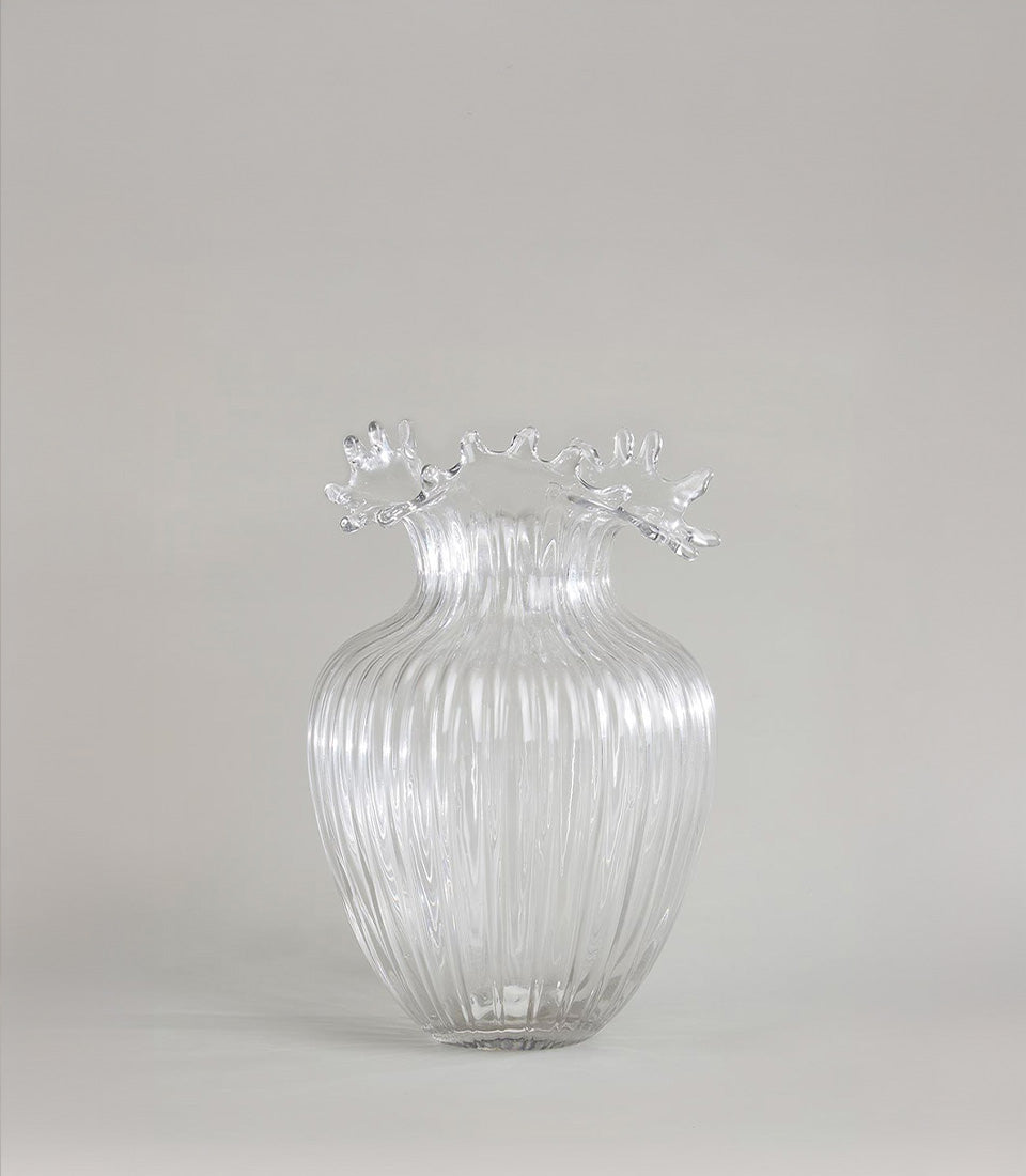 Clear ribbed glass vase with ruffled rim and organic wave design