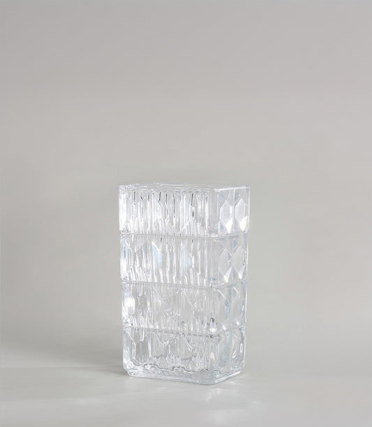 Geometric textured clear glass vase with carved diamond and faceted patterns